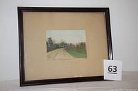 Full view of the framed hand-colored photograph showing the dirt road and surrounding greenery in Valley Forge Park.