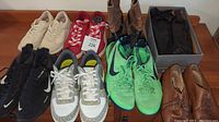 Overview of 8 pairs of men's shoes including Nike athletic shoes, dress shoes, boots, and formal black shoes.