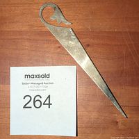 Photo of the Gorham American Heritage sterling silver letter opener showing front view and design details.