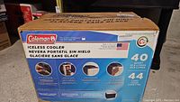 Box front showing Coleman brand, cooler capacity, and product usage features