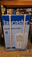 Lancaster dehumidifier box front showing brand and product image.