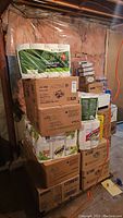 Stacked cardboard cases showing EcoSoft singlefold towels, Bounty and Green paper towels