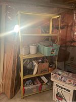 Front angled view of one shelving unit with items