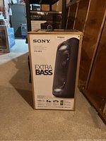 Front of sealed original Sony box showing Extra Bass branding and model number
