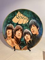 Front view of the limited edition Beatles 'Rubber Soul' plate with detailed album artwork and gold rim.