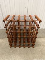 Wooden wine rack from top view showing horizontal storage compartments for wine bottles