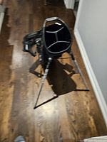Top-down view showing 4-way club dividers and stand legs extended