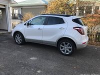 Left side profile view showing body, wheels and tires