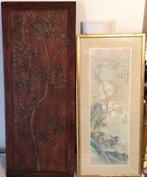 Wooden panel with detailed carving of a flowering tree, dark wood finish, rectangular and tall.