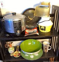 Overview of two-tier shelf showing all lot items