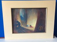Framed lithograph shows Mickey Mouse in sorcerer's robe standing near a large shadowed interior space with an embossed gold seal in bottom right corner.
