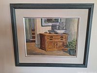 Framed original painting depicting interior with sideboard, basin, pitcher and potted plant.
