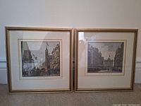 Full view of two framed historical prints showing old Toronto street scenes with horse-drawn carriages and pedestrians.