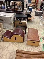 Overview of all three pieces: metal Pilates chair, spine corrector barrel and Pilates box