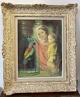 Frontal view of the painting and ornate frame