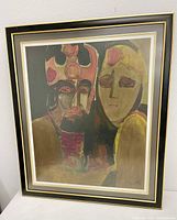 Front view of framed painting showing two abstract figures