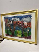 Front view of framed abstract expressionist watercolour painting by Susan Owen Kagan showing bold colors and shapes.
