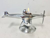 Side view with flame lit in cockpit