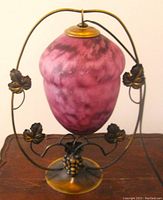 Vintage hanging grape bunch table lamp with large purple-pink marbled glass shade shown unlit