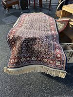 Top view of rug showing pattern, fringe and overall shape