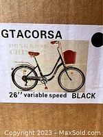 Label showing black GTACORSA step-in bicycle with 26 inch wheels and variable speed 7