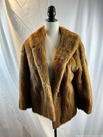 Full front view of jacket on mannequin