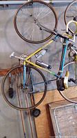 Full left side view of bicycle hanging in garage
