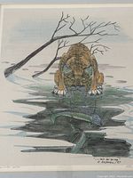 Close view of the watercolor-style print showing the bobcat crouched on ice looking at fish with artist signature and numbering.