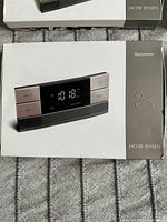 Front of the original box showing the barometer's modern design by Jacob Jensen and the word 'Barometer'.