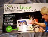 Box of Audio Homebase message center and digital picture frame showing features and usage