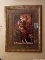 Front-facing photograph of the framed wall art mounted on a wall