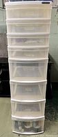 Front view of Sterilite plastic organizer showing all seven drawers closed and yellowed plastic.