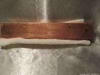 Copper bar front side showing stamps: '3 POUNDS', '999 SOLID COPPER', and 'GUSTASON MINT'.