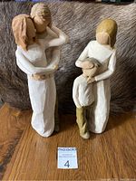 Two Willow Tree figurines together showing mother and son poses.