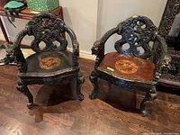 Pair of chairs from front showing overall design and finish