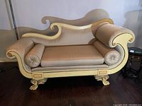 Front view of chaise lounge showing overall shape and upholstery