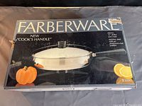Original packaging for Farberware electric skillet showing 'New Cook's Handle', image includes full product depiction and front branding.