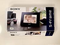 Top view of Sony S-Frame digital photo frame original box showing model number DPF-A710 and 7-inch screen size