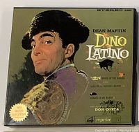 Close-up image of Dean Martin Dino Latino reel to reel tape with colorful matador artwork on the cover