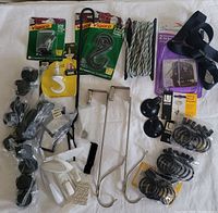 Full overview of all items: assorted hooks, holdbacks, S-hooks, rope, and mounting hardware.