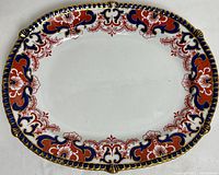 Top view of the Royal Crown Derby Imari platter showing detailed red, blue, and gold pattern around the rim.