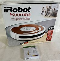 Original packaging box of iRobot Roomba 530 vacuum cleaning robot showing front and top with product image and branding.