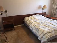 Wide view of headboard with both attached nightstands from left