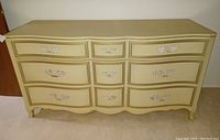 Front view of nine-drawer dresser with drawers closed