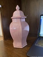 Pink lidded container with 5-sided shaped ceramic body and smooth glossy pink finish