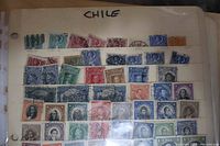 First page of Chile stamp stock book with various used stamps displayed in rows under "Chile" heading.