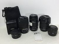 Overview of all lenses, hood, adapter, and carrying bags