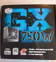 Front view of Cooler Master GX 750W power supply box showing brand, wattage, and key features such as 80 Plus certification, single +12V rail, and warranty info.