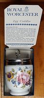 Egg coddler in original box showing floral pattern and usage instructions