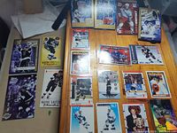 Full layout of approximately 22 various Wayne Gretzky hockey cards, showing a diverse collection of card designs and years.